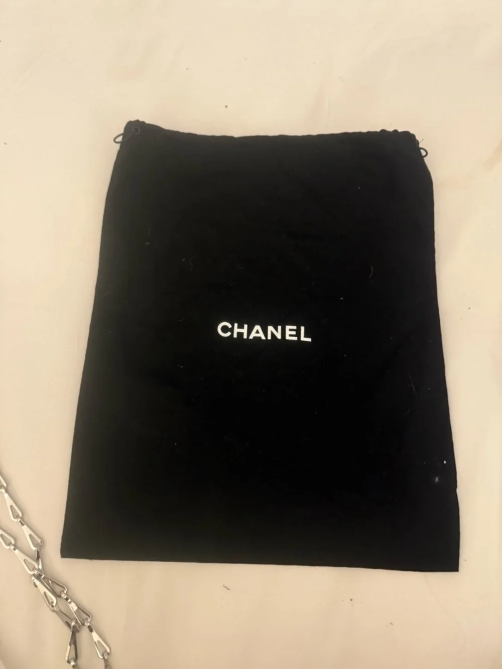 CHANEL Black Drawstring Pouch White Logo